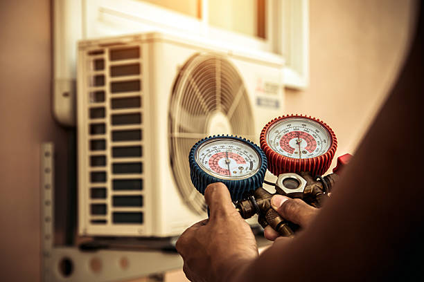 Professional Hvac technician working in Mendota, MN